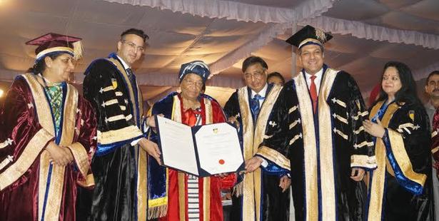 Amity Confers D.Phil. Degree to President of Liberia